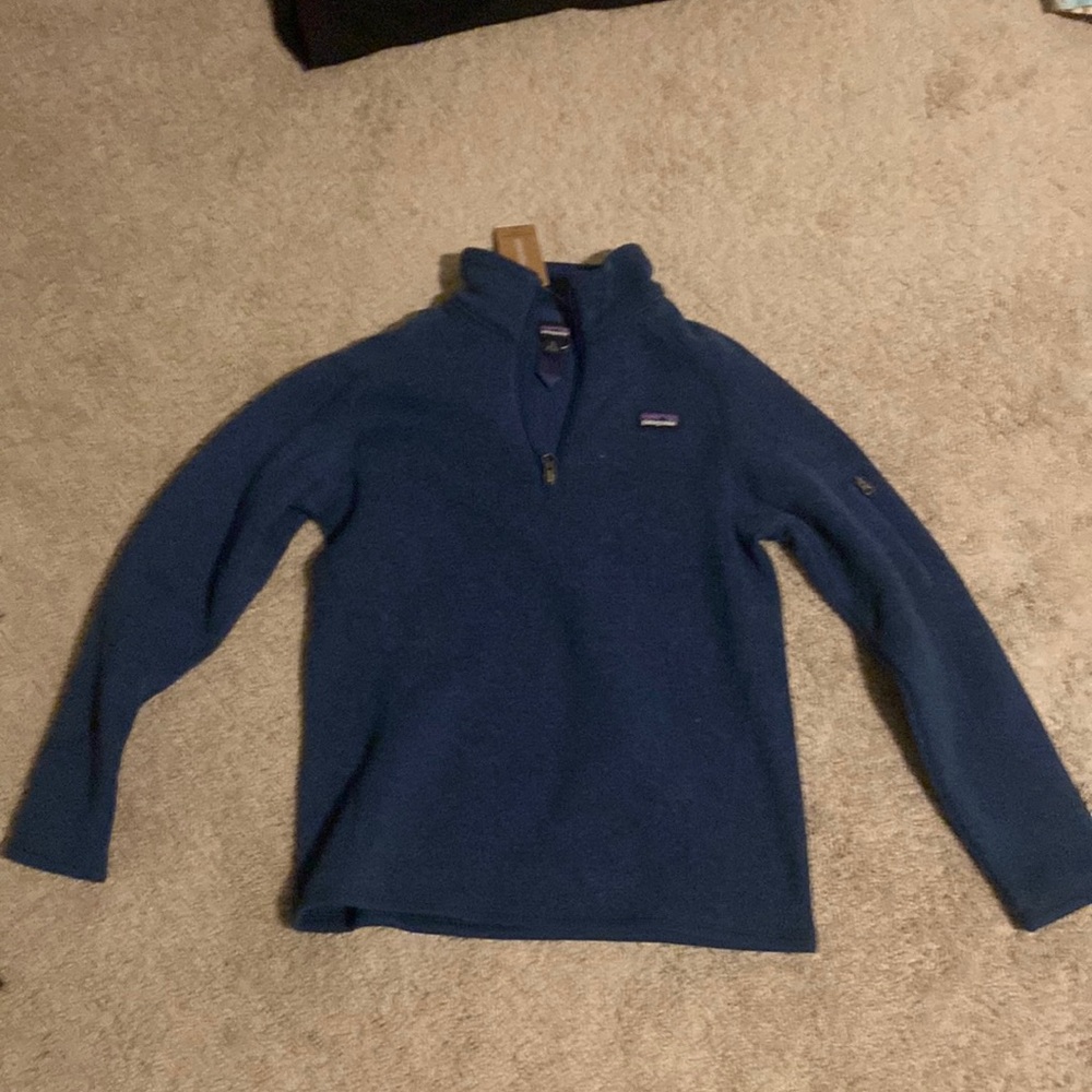 I am selling a navy Patagonia sweatshirt.